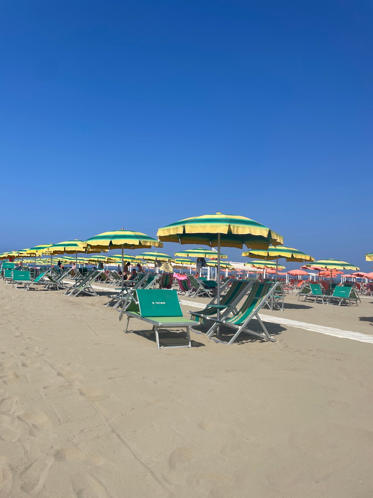Early morning at a Viareggio beach club, calm and unhurried.