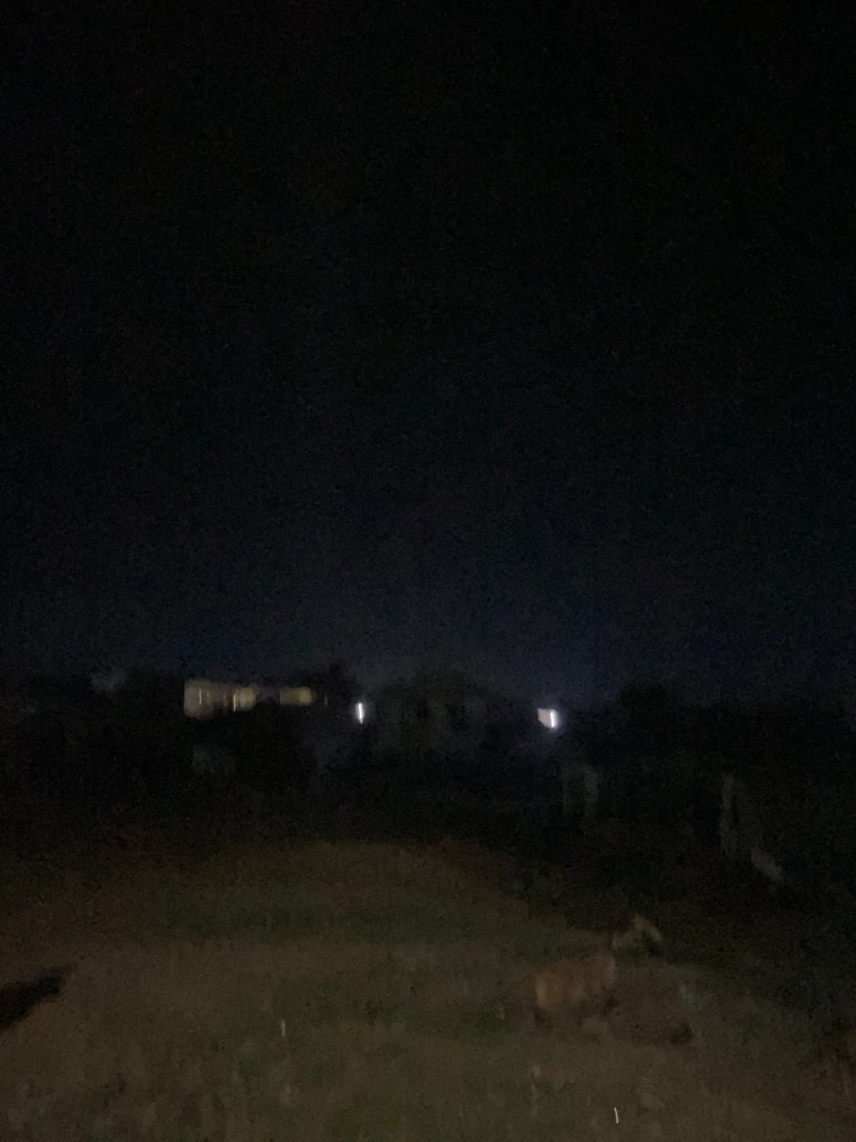 Evening in a Lokoja neighborhood, streets and homes after dark