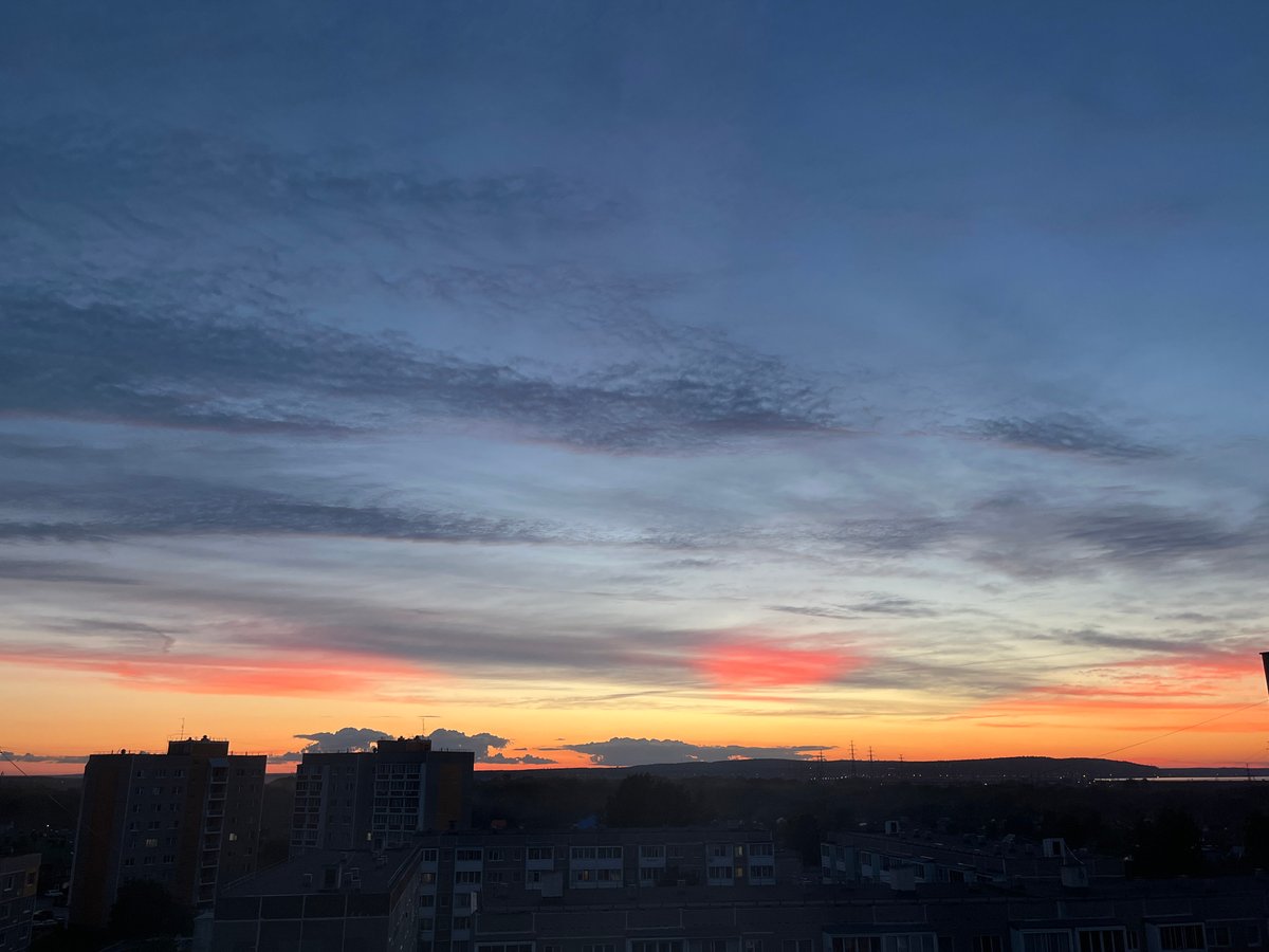 Solstice sunset over Chaikovsky, kids at the playground