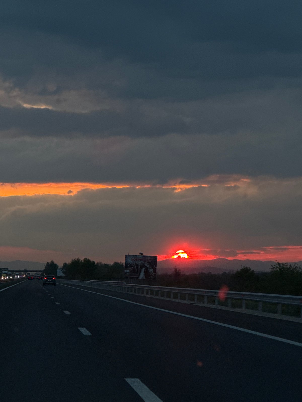 Dramatic sunset observed over highway in Malo Konare, Bulgaria