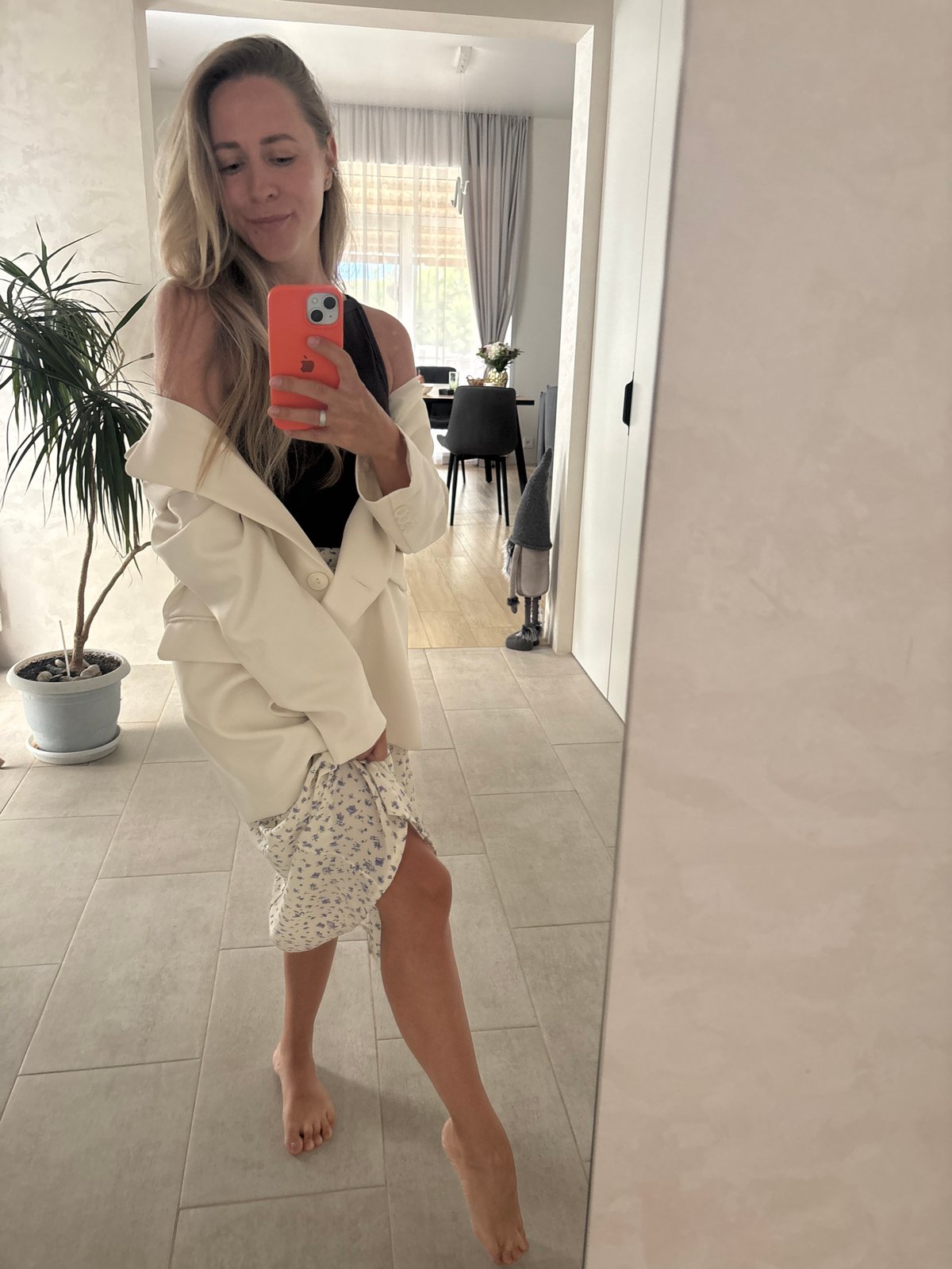 Mirror selfie session in a Chaikovsky room, floral skirt and blazer