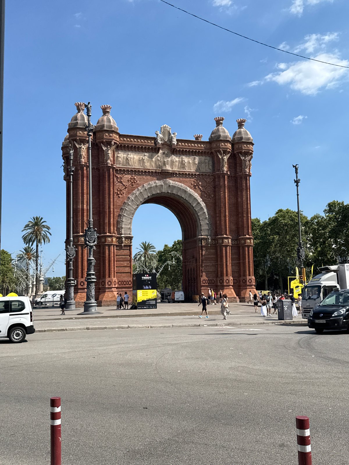 Arc de Triomf, Tour de France flags, and preserved fruits in Barcelona