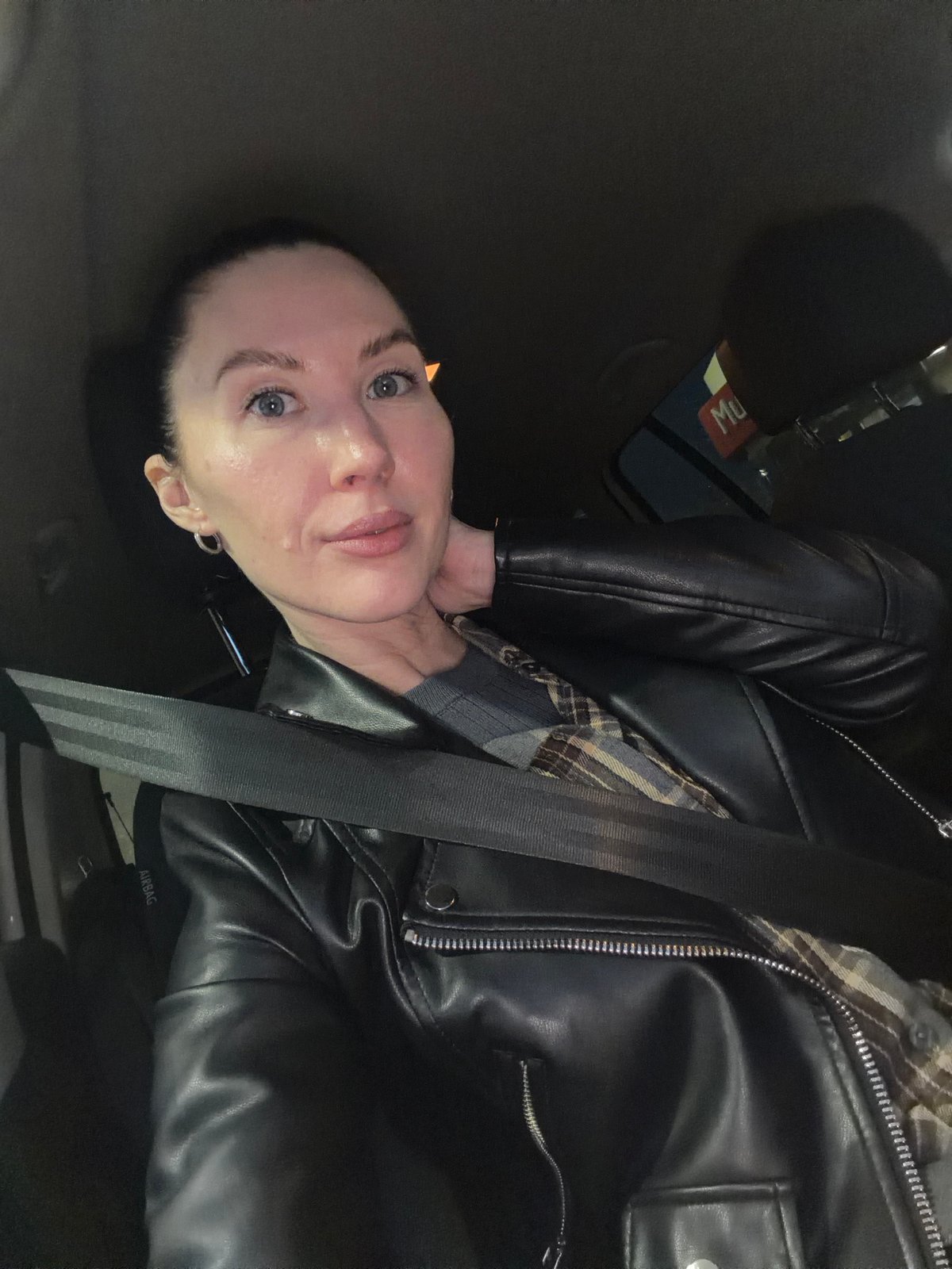 Two women capture selfie during evening drive in Perm