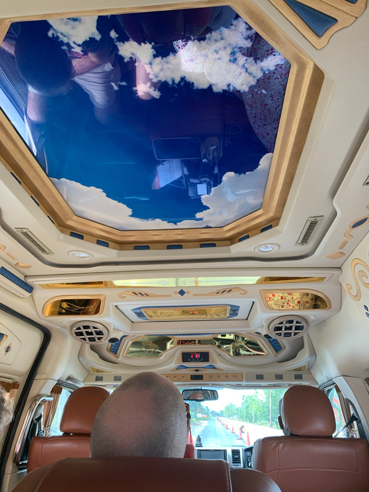 Ornately decorated van interior observed in Thailand