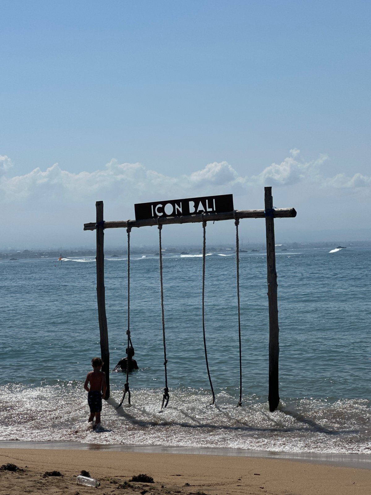 Beach, resort, and street-level snapshots around Denpasar, Bali