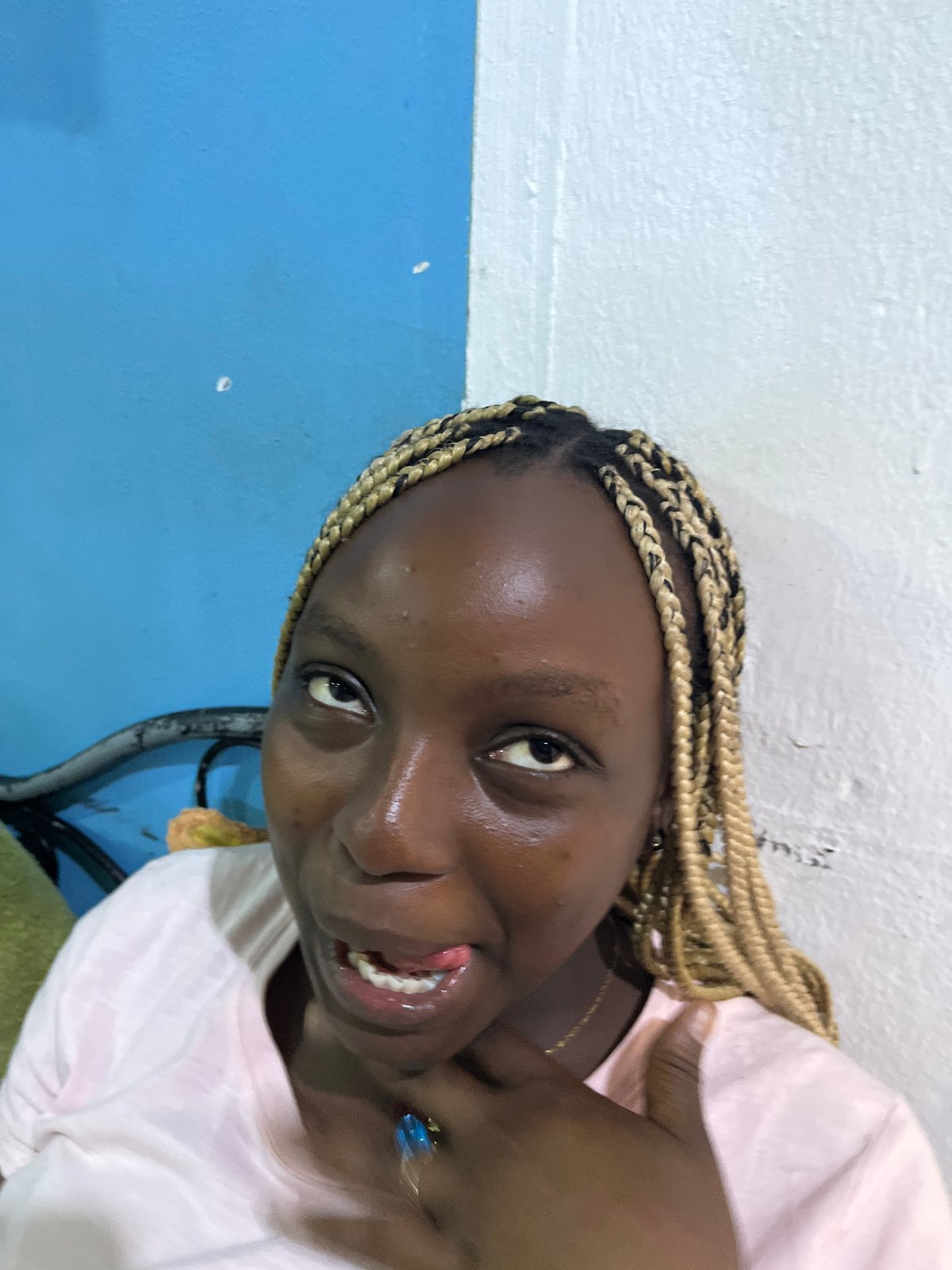 Woman poses for photos indoors during brief afternoon session