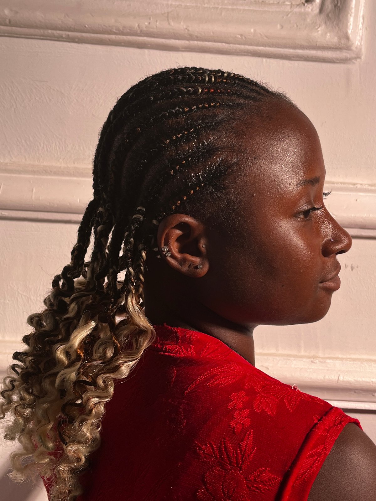 Woman photographed in red dress during informal portrait session