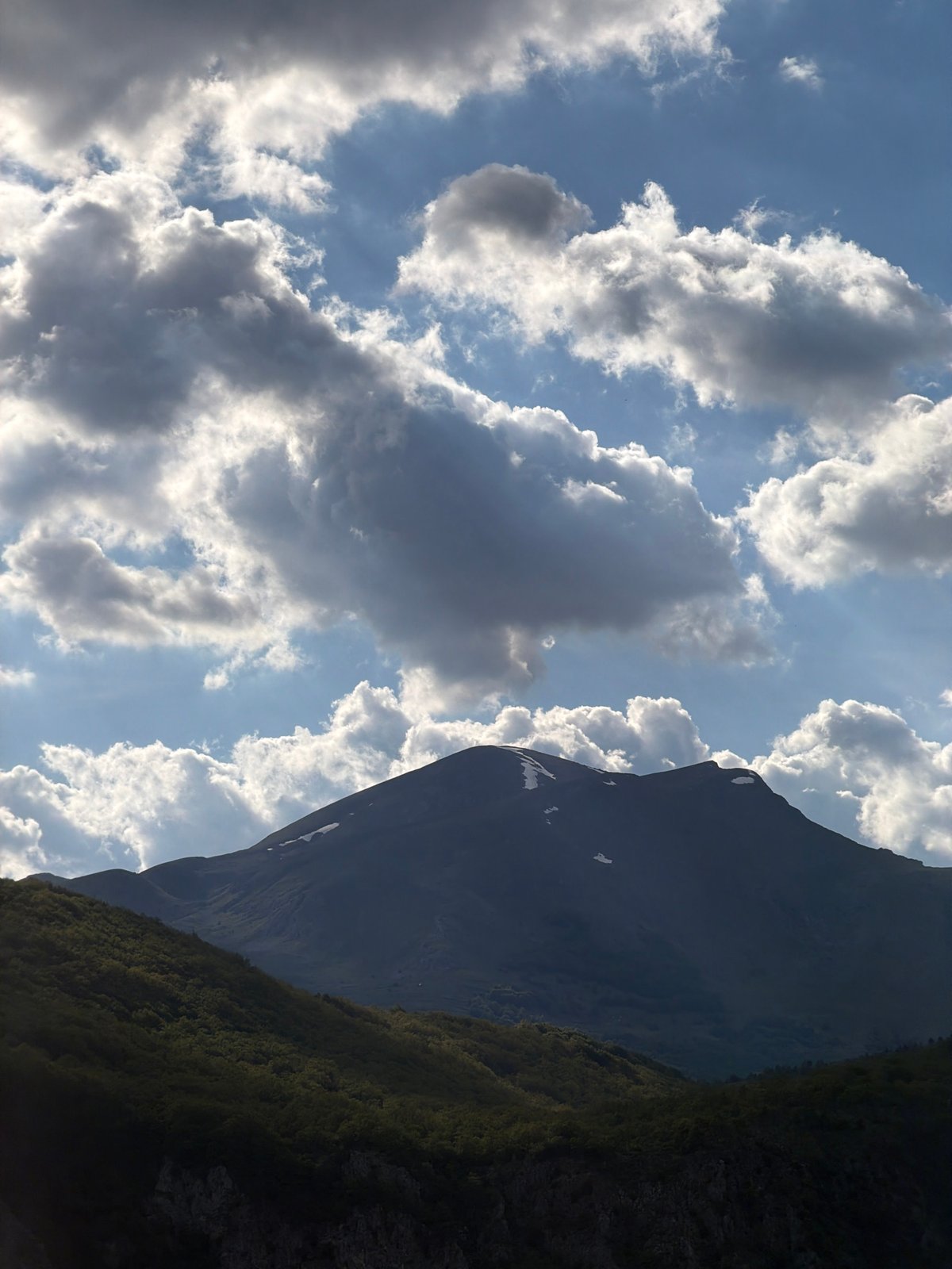 Mountainous landscape with blue water documented near Plužine, Montenegro