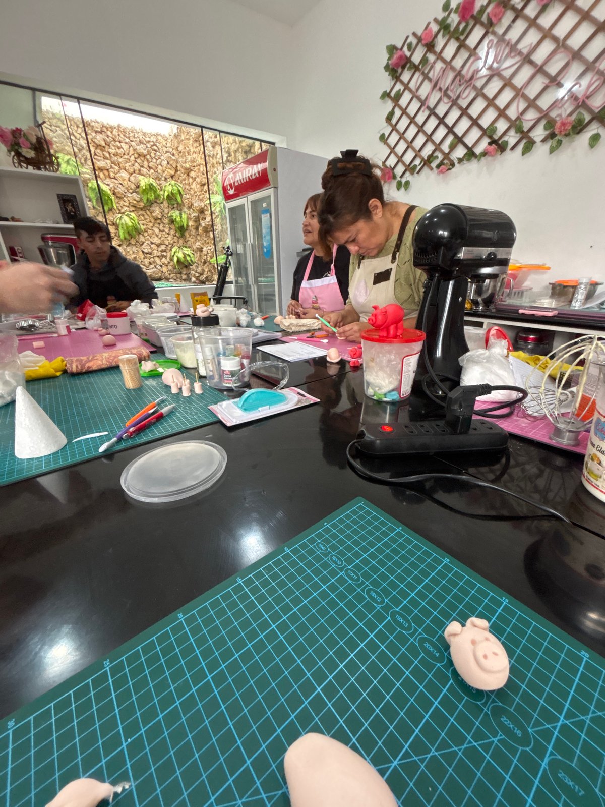 Cake decorating class in session, San Borja, Peru
