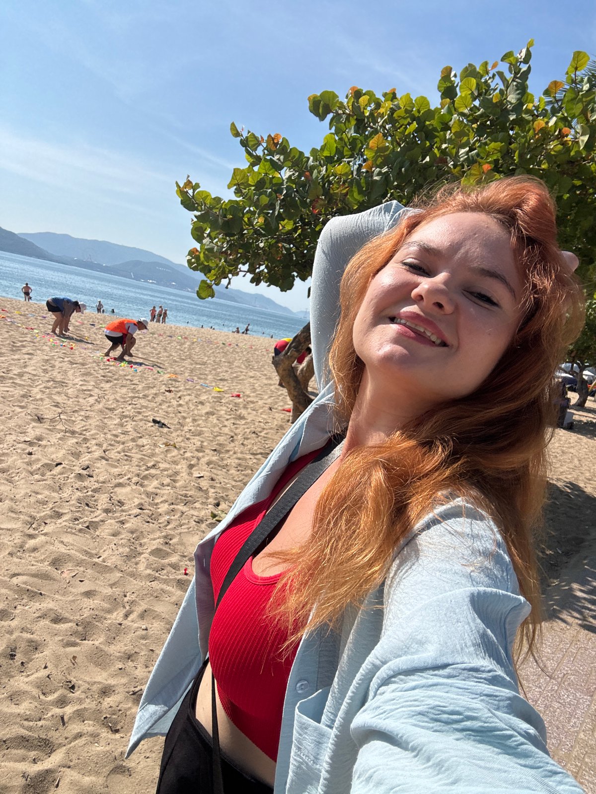 Beach activity and park life along Nha Trang's waterfront