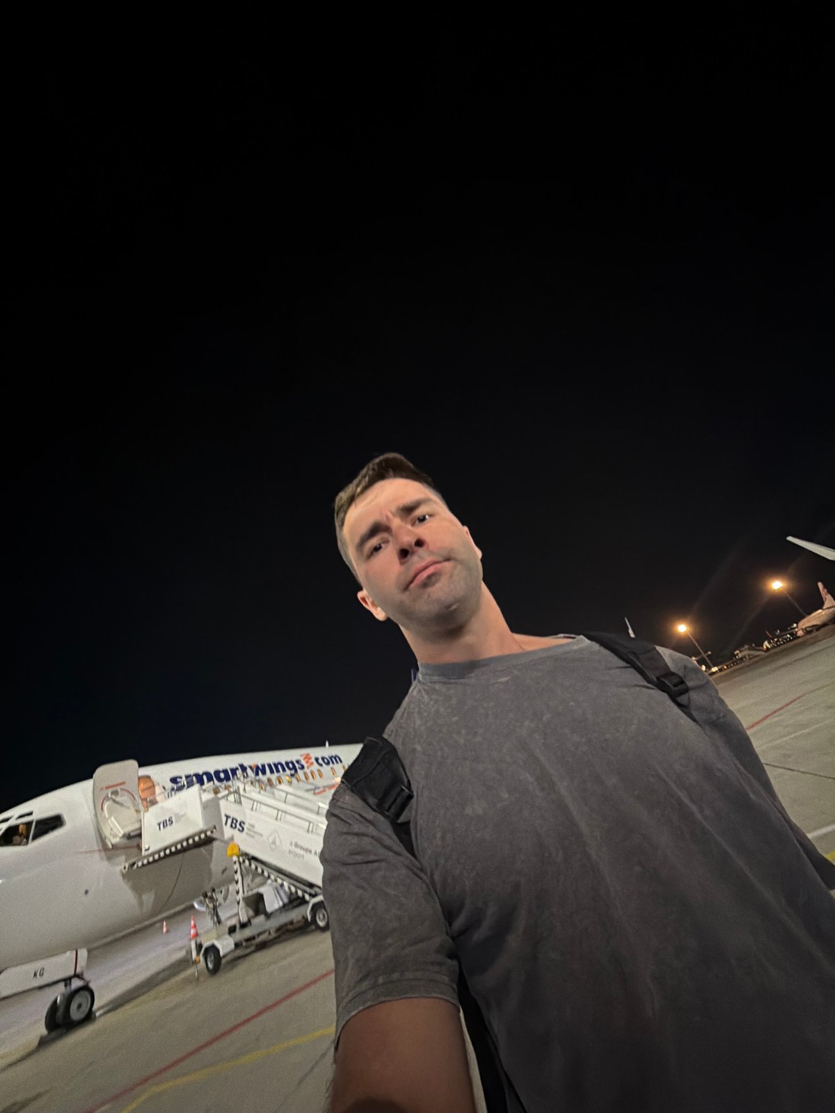 Smartwings aircraft on night tarmac at Tbilisi Airport