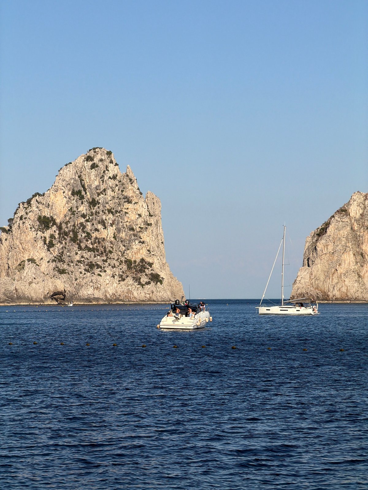 Coastal scene with boats documented in Capri waters