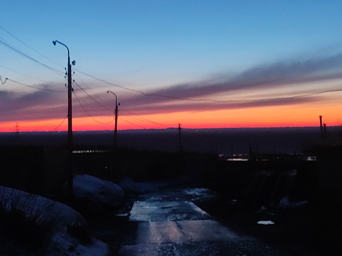 Dusk street scene captured with colorful sky transition