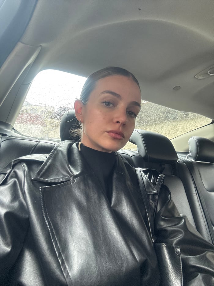 Woman documented in vehicle, elevator, hallway over two minutes