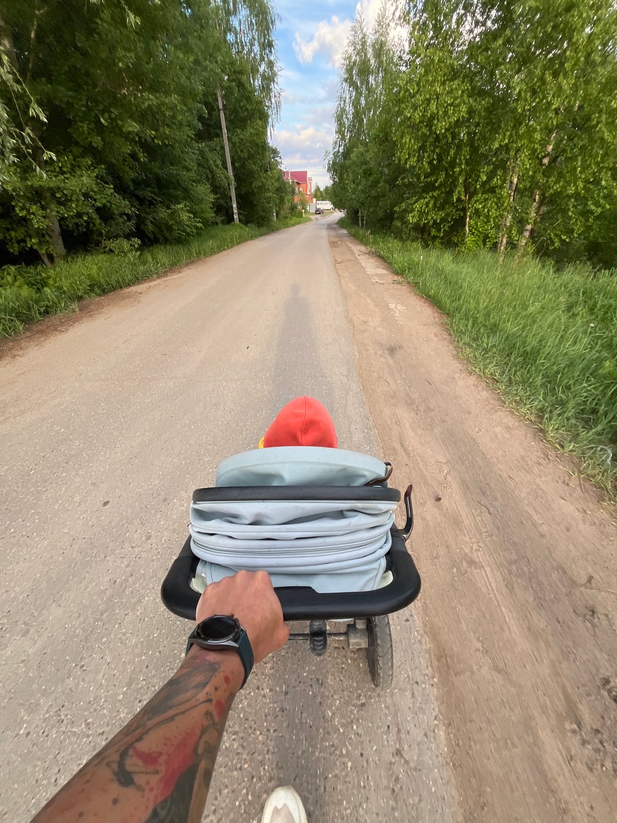Parent with children enjoys afternoon stroll in Chaikovsky, Russia