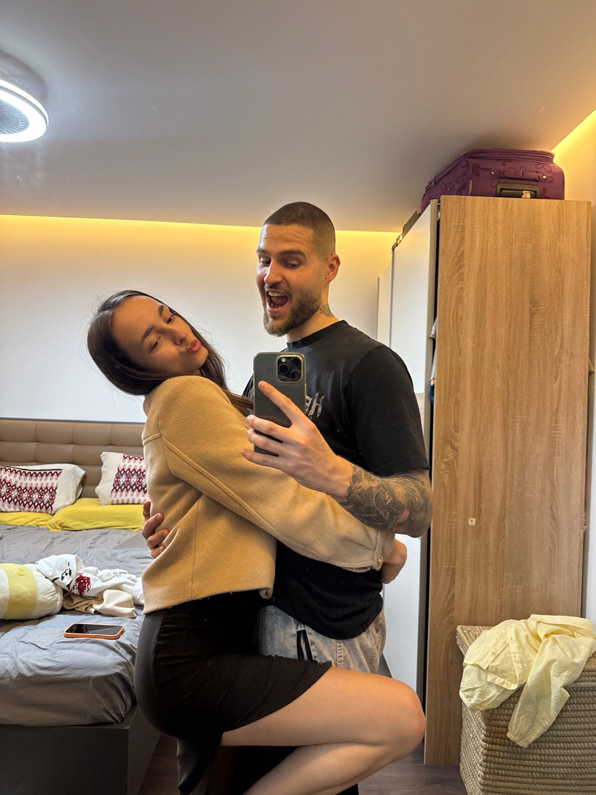 Couple takes selfies in Sofia room Friday evening