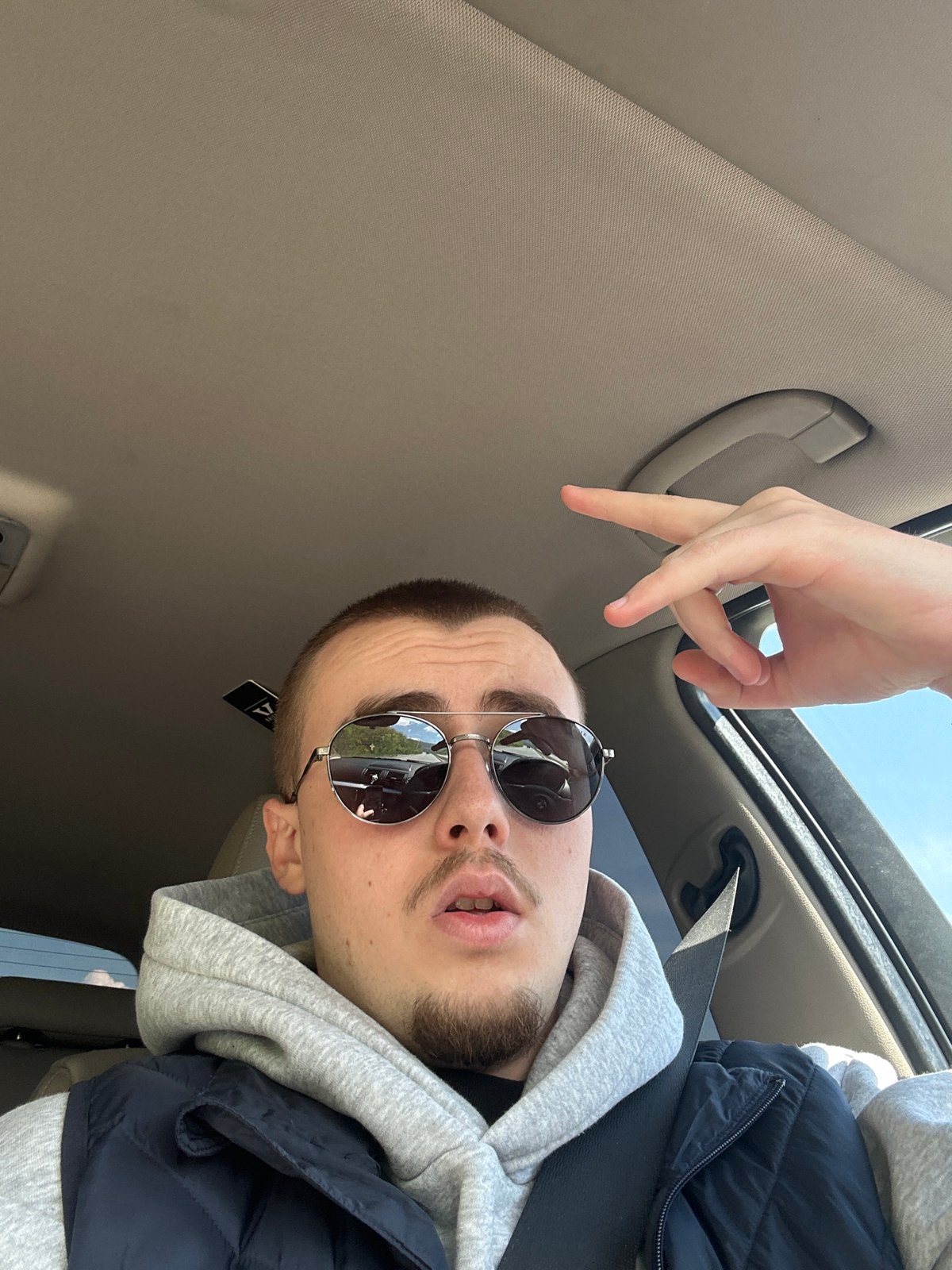 Driver spotted in BMW with open sunroof in Sofia
