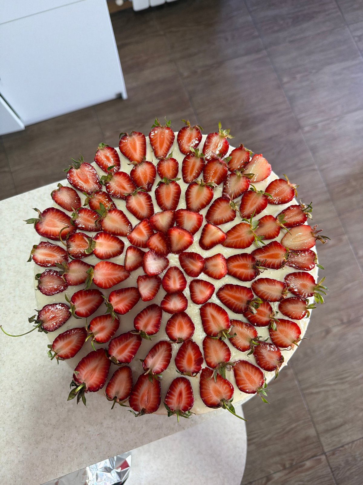 Strawberry cake photographed from multiple angles in Tbilisi