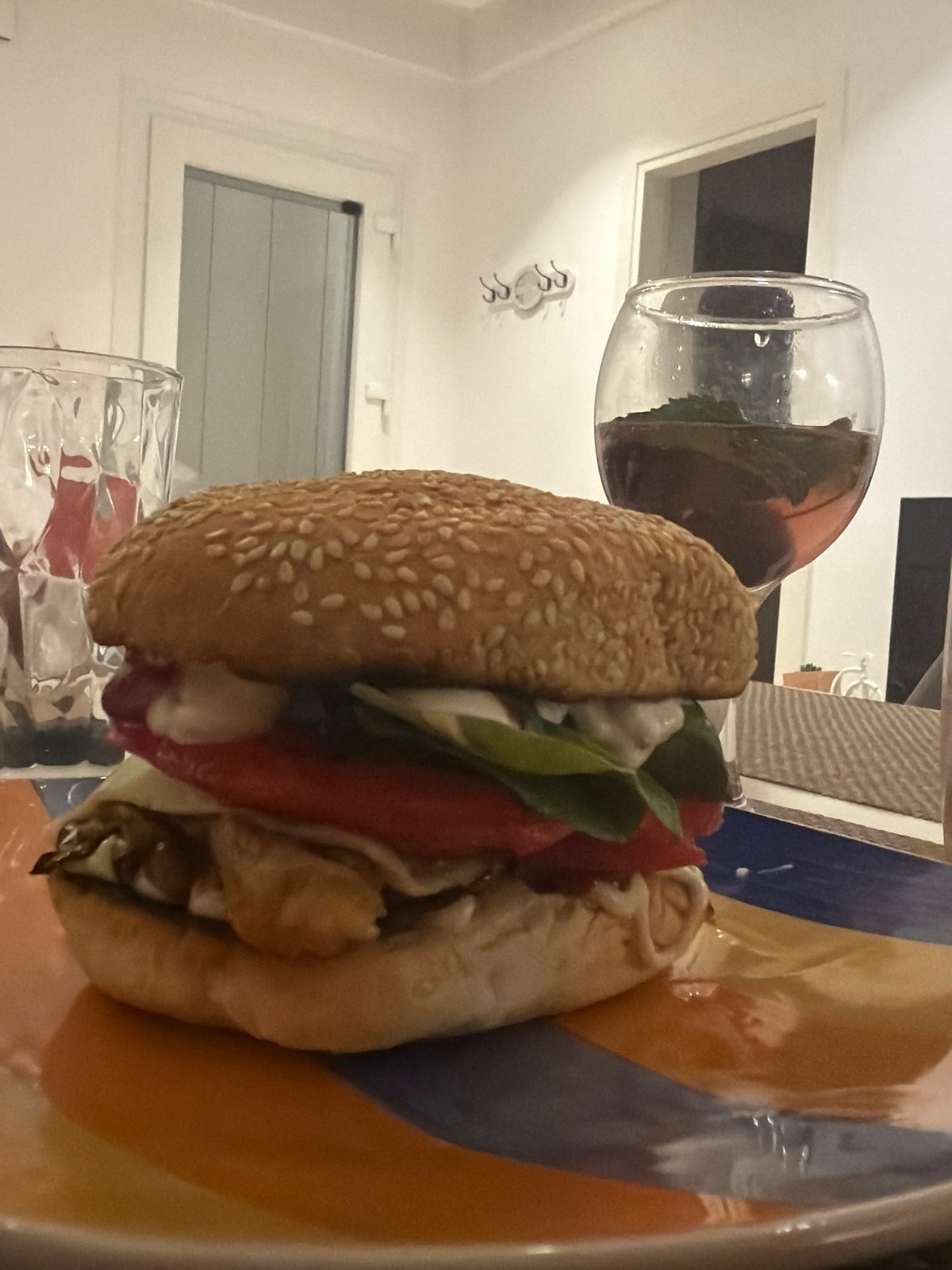 Olive groves at dusk, a burger, and a modern kitchen