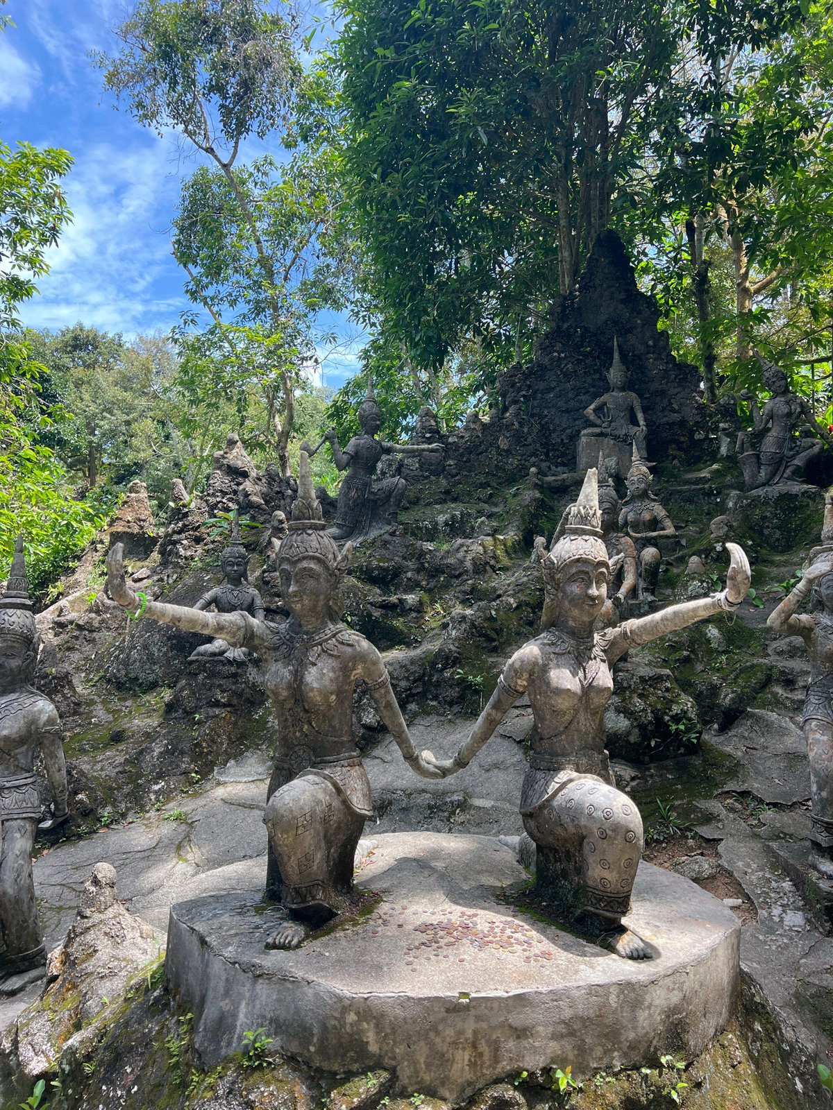 Exploring Koh Samui's hillside Secret Buddha Garden at dawn