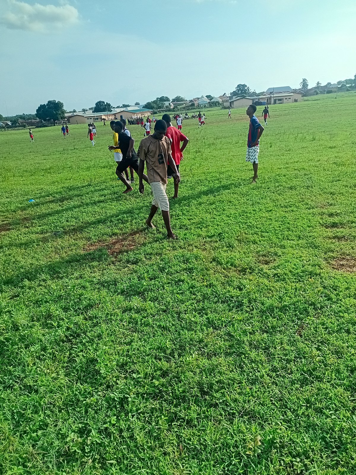 Football team trains on community field in Ogbogbo, Nigeria
