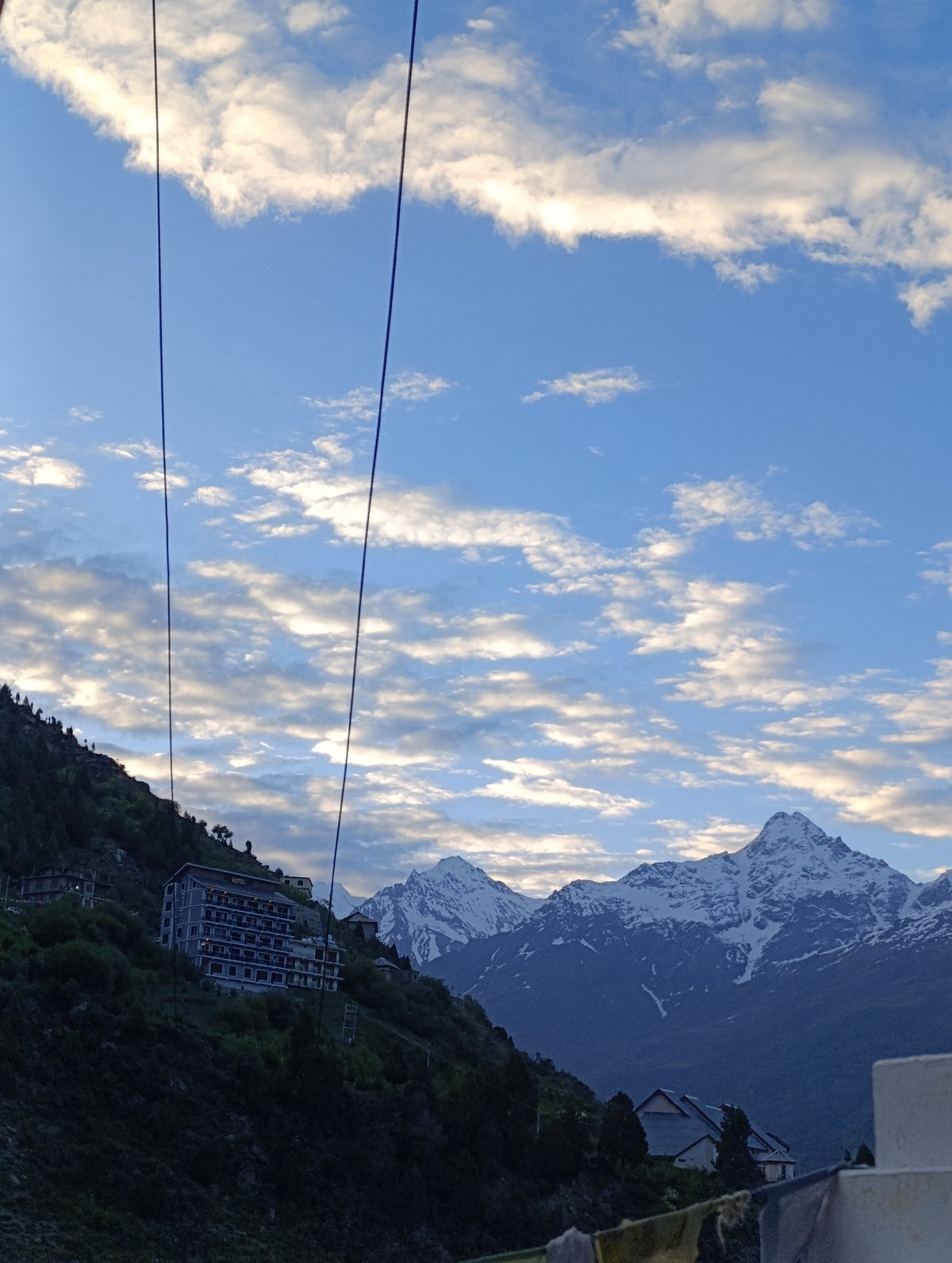 Buddhist stupas and snow peaks in the Himalayas near Kardang