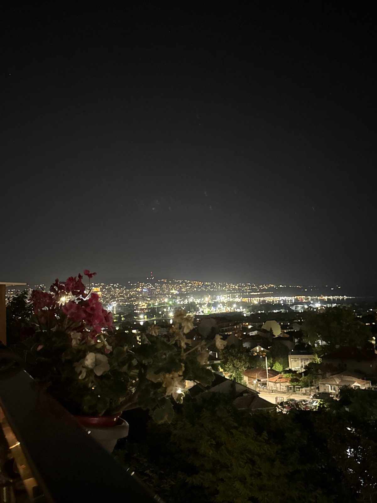 Mixed personal feed: city nights, text graphics, and random snippets