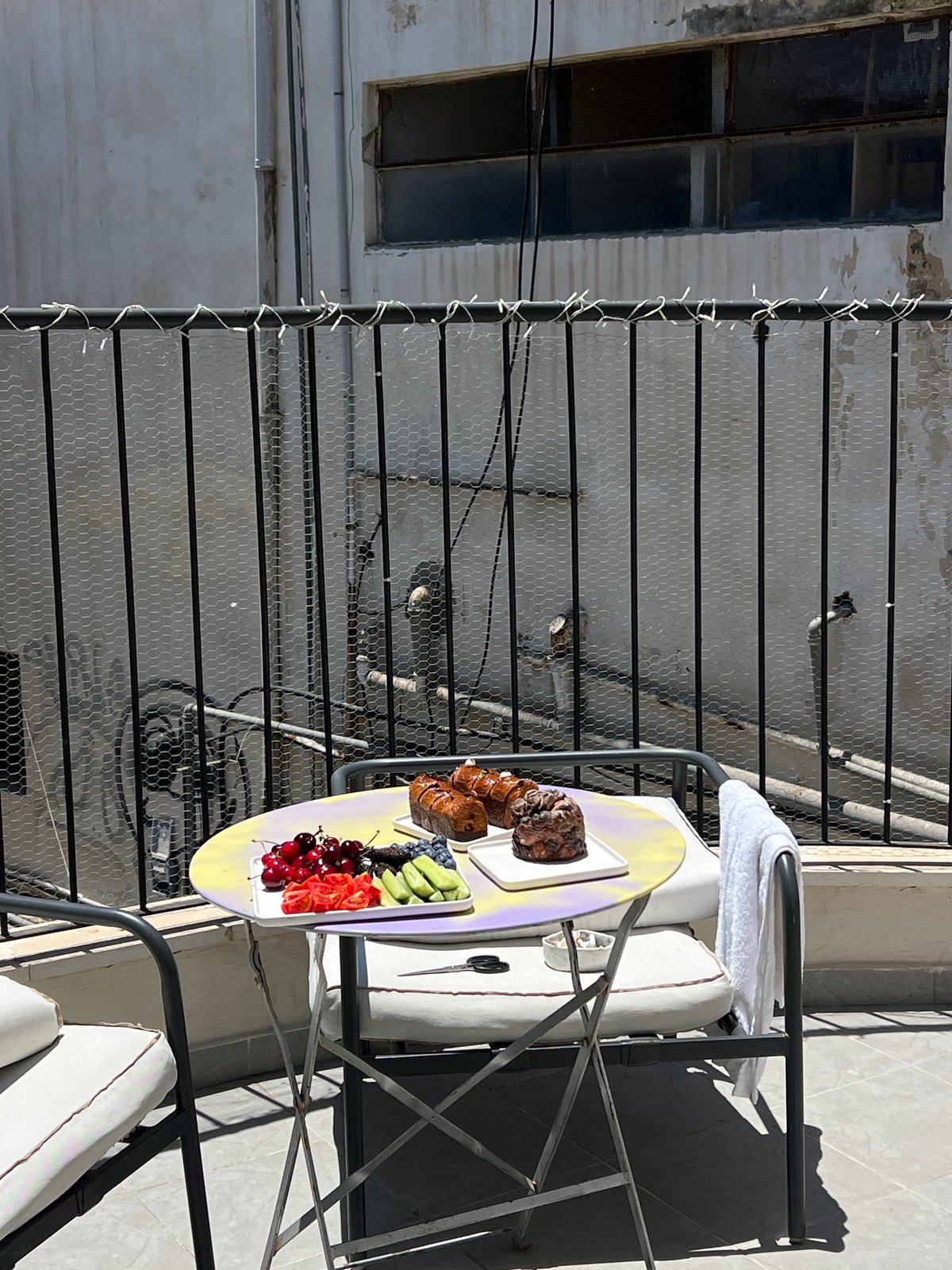 Morning brunch setup observed on colorful table in Tel Aviv