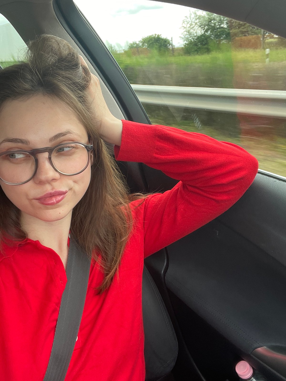 Woman in red observed driving through Kőszárhegy, Hungary