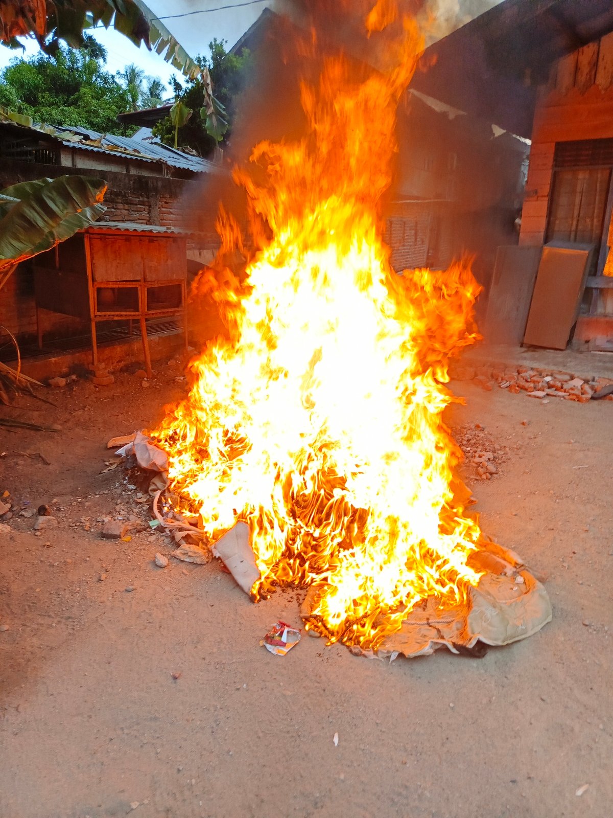 Large fire burns on ground in Lhokseumawe, Indonesia