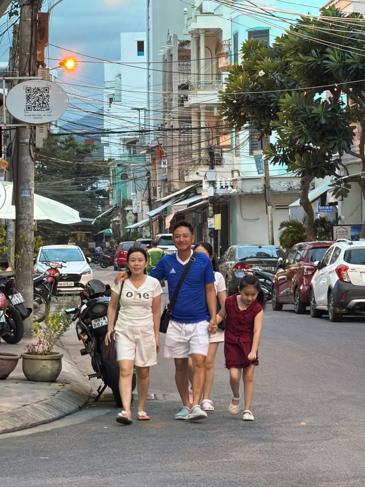 Nha Trang streets and skyline at dusk, July 2026