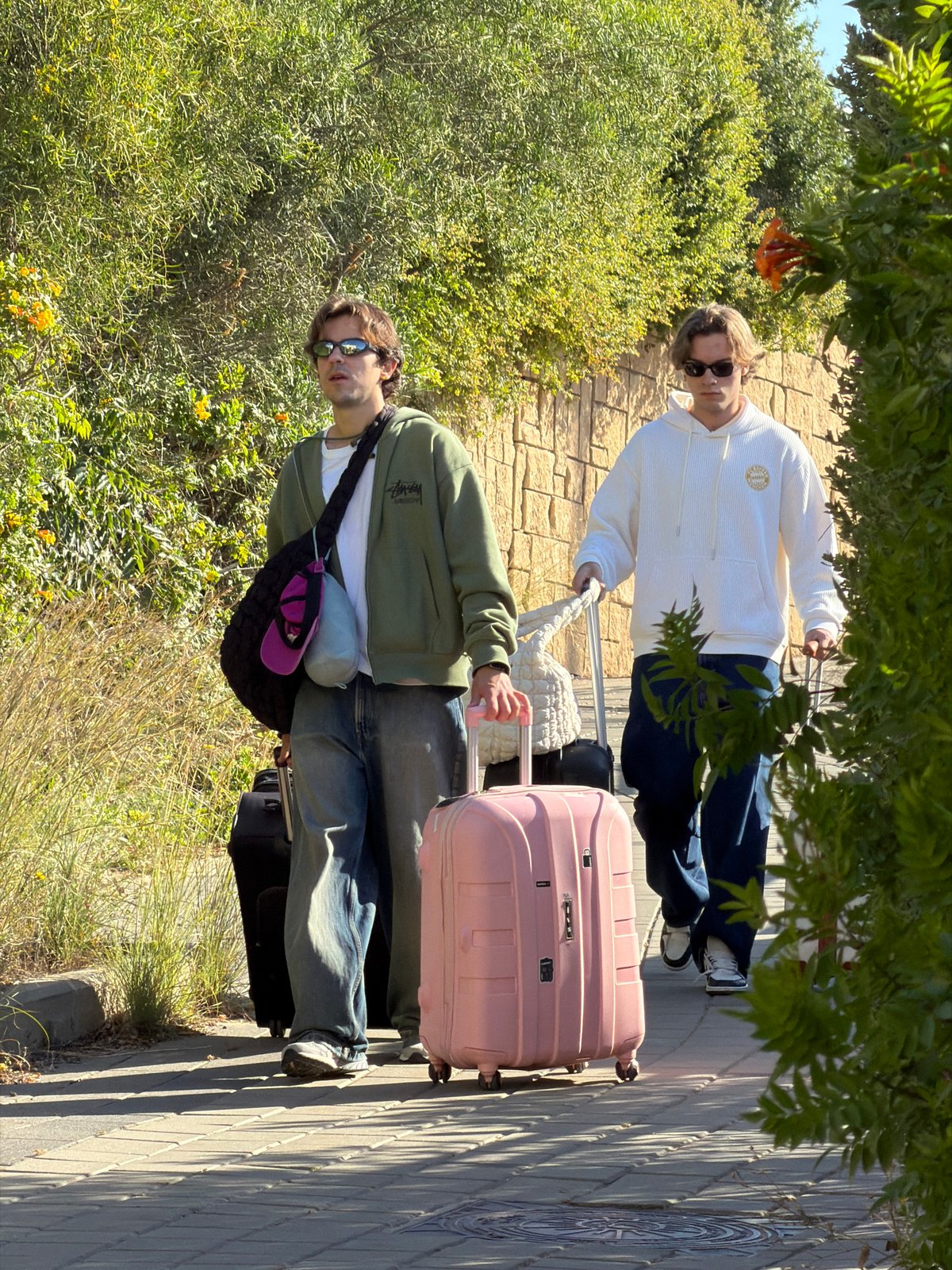 Morning walkers and luggage spotted in Tel-Aviv
