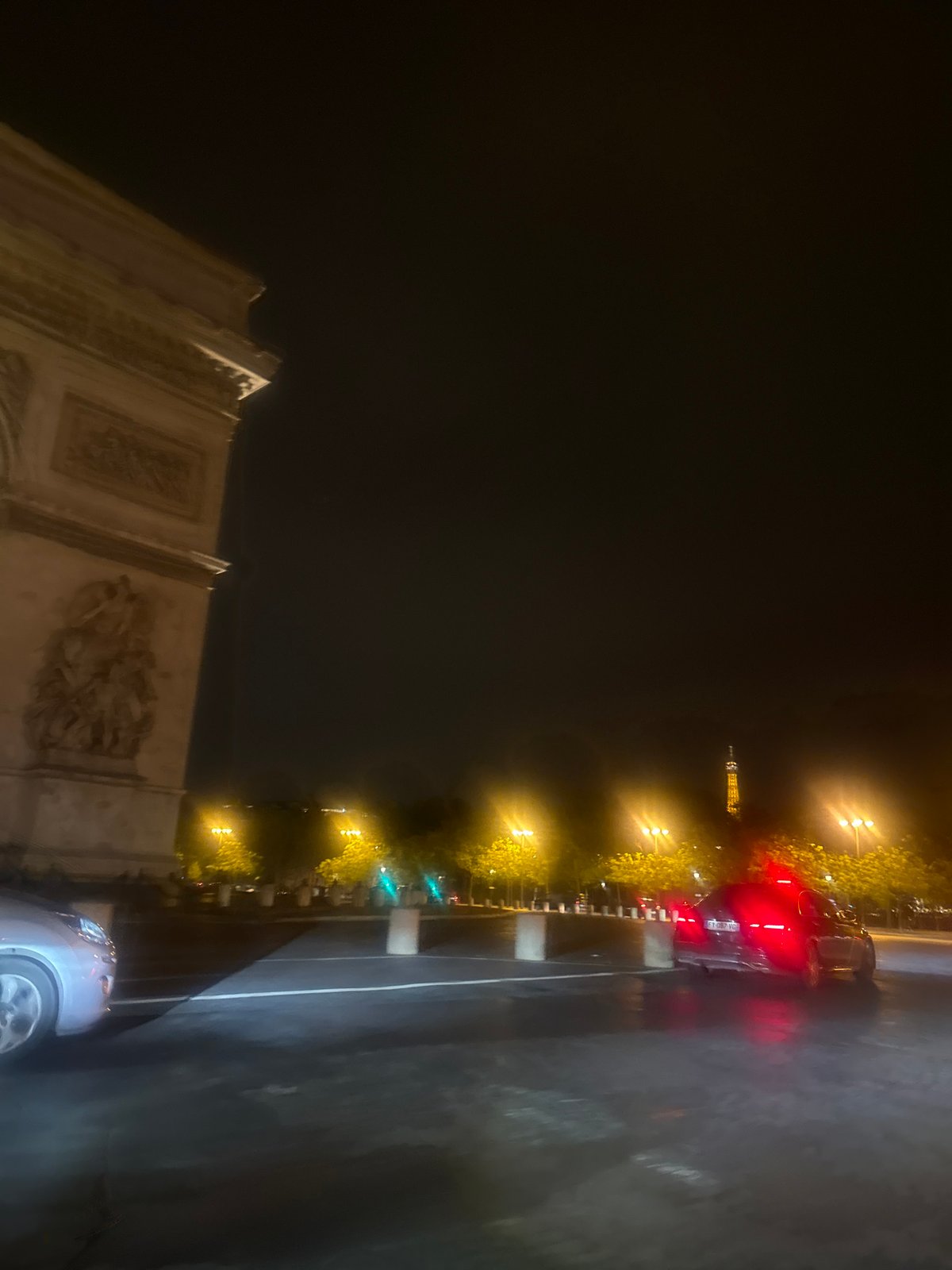 Nighttime illumination captured at Arc de Triomphe in Paris
