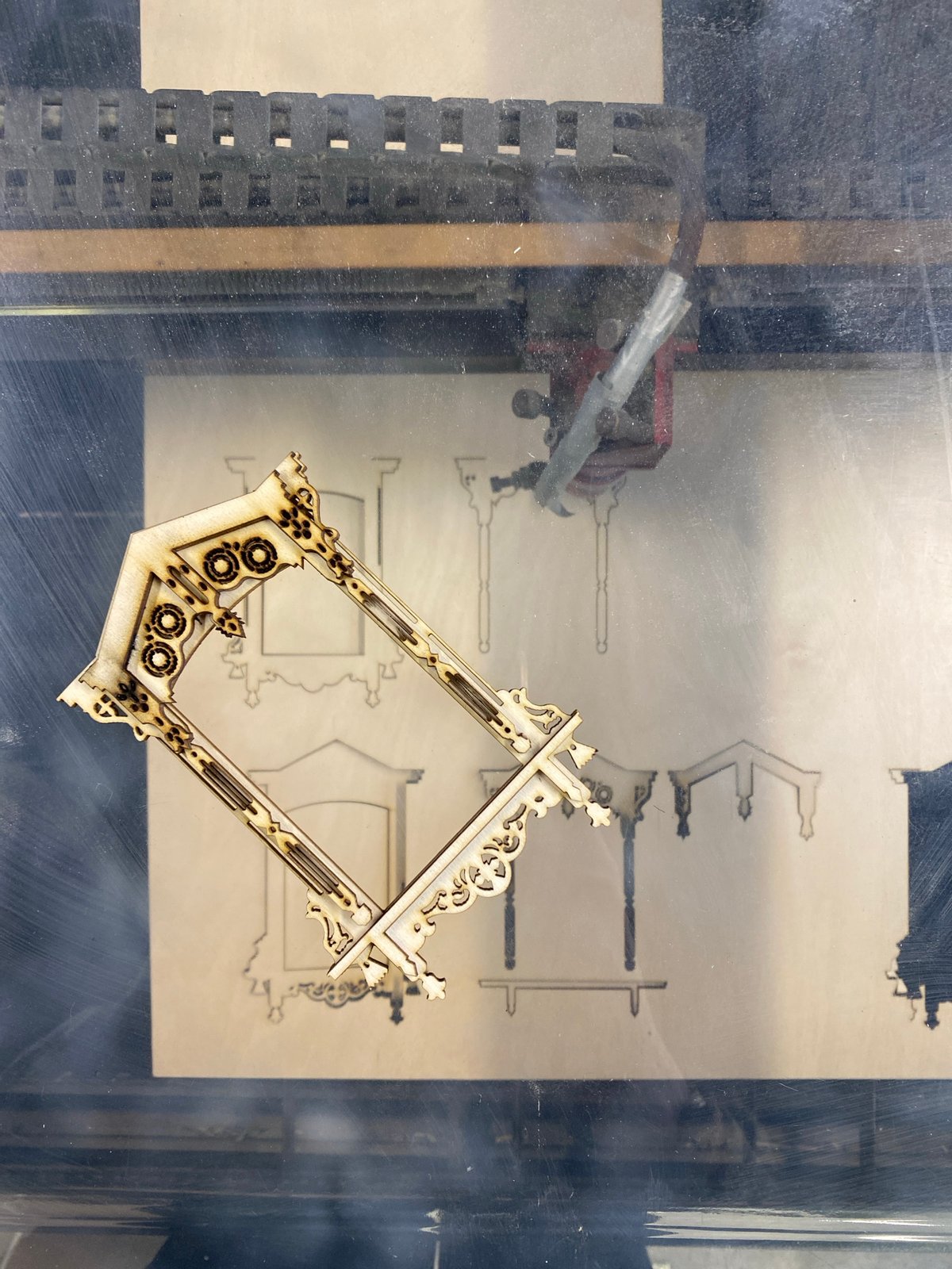Laser cutter operates on wooden frame in Moscow