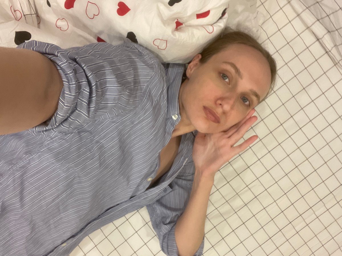 Woman takes bedroom selfies in Подшивалово, Russia