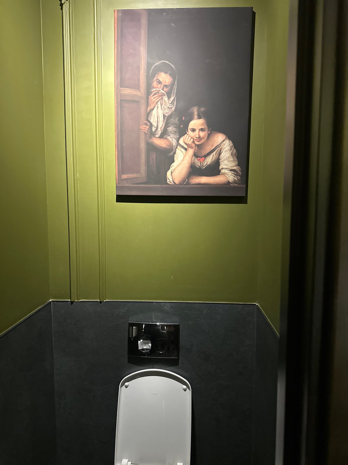 Bathroom features classical art reproduction in Saint Petersburg home