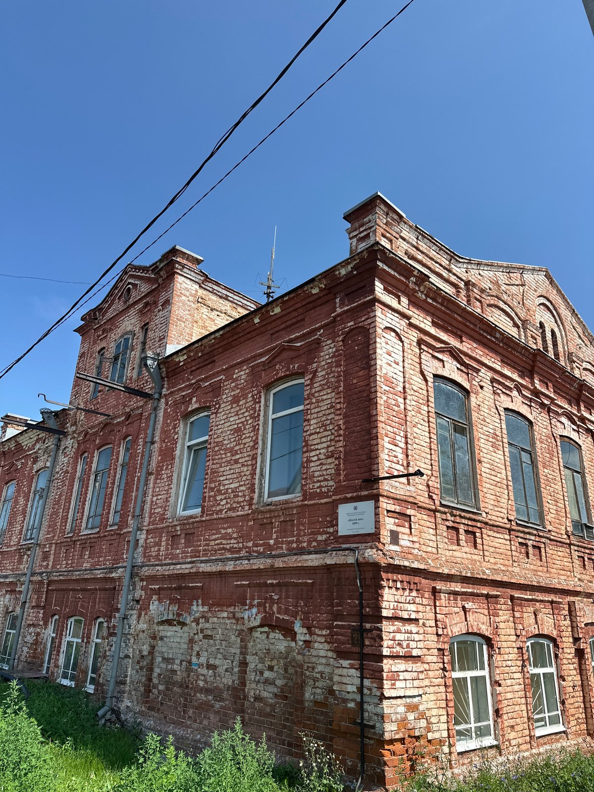 Historic brick and carved wooden buildings in Biysk, Russia