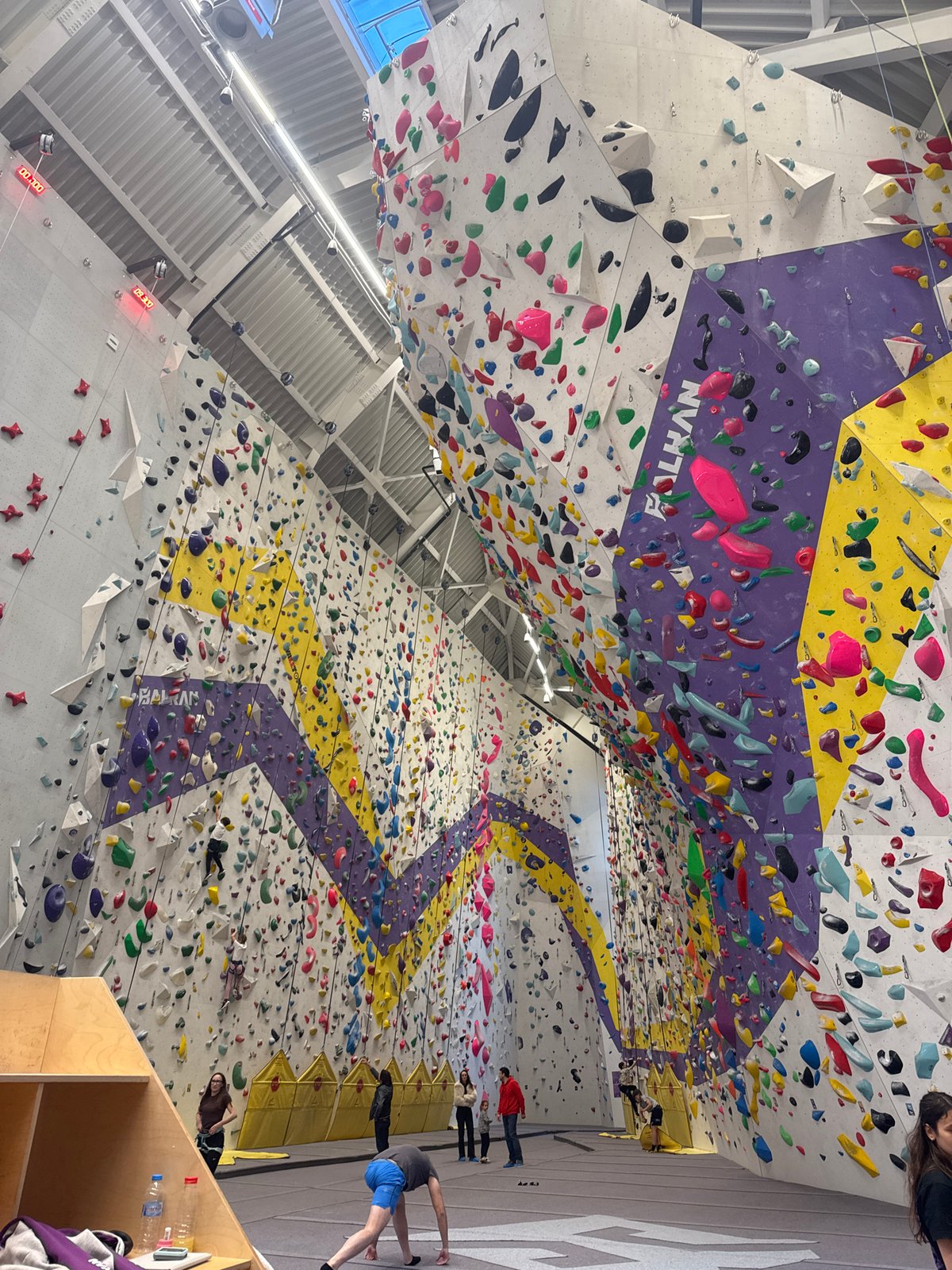 Man rock climbs at indoor gym in Sofia