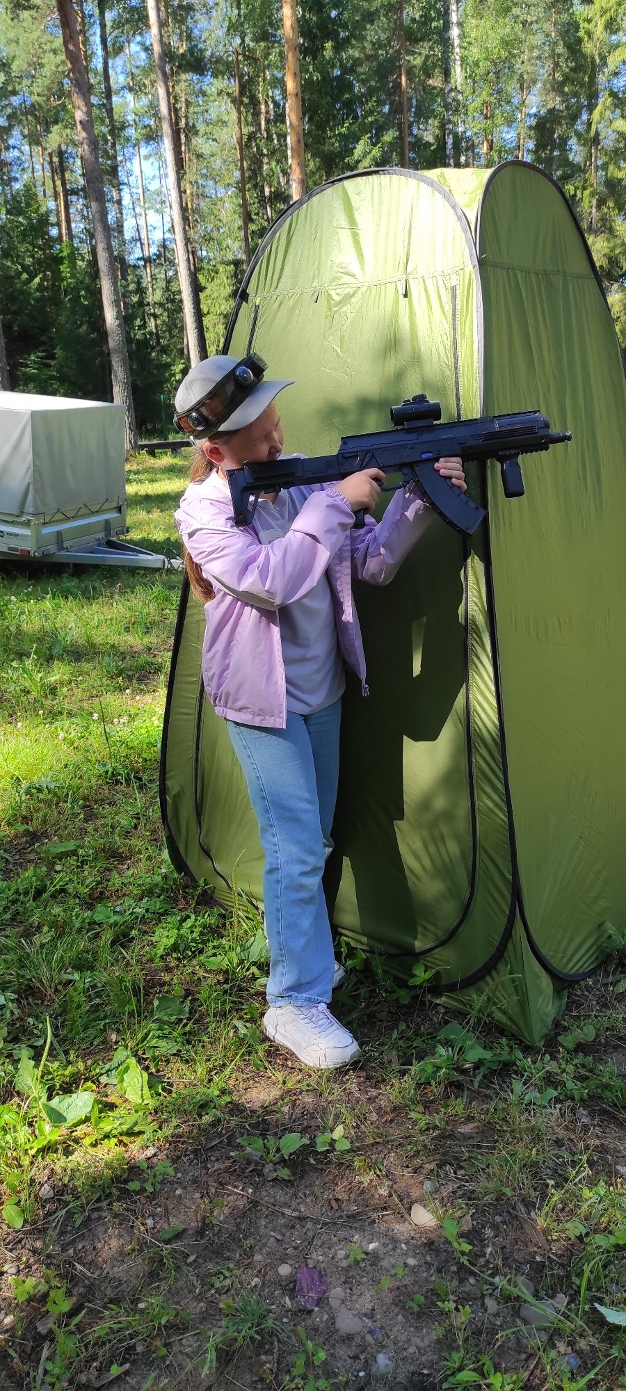 Outdoor laser tag session in a wooded Noviy arena