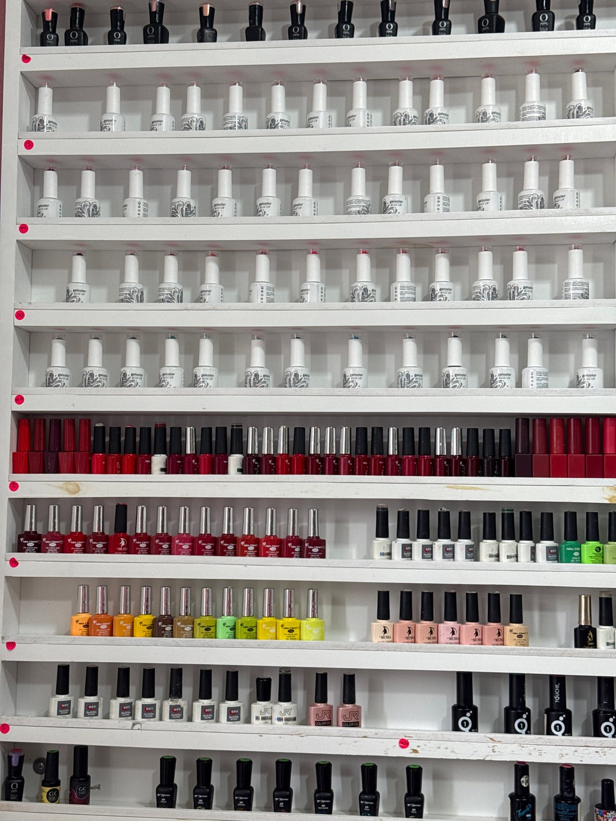 Nail polish display documented at Cholula beauty establishment