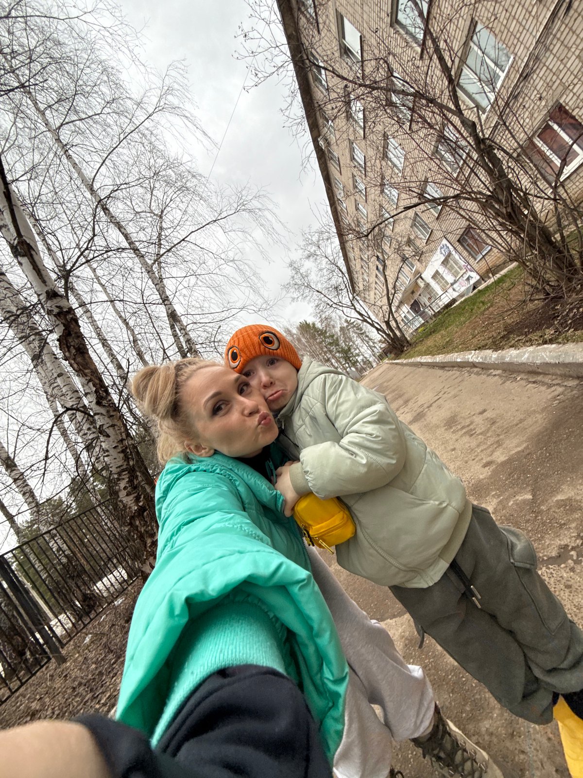 Mother and child take winter selfie in Chaikovsky, Russia