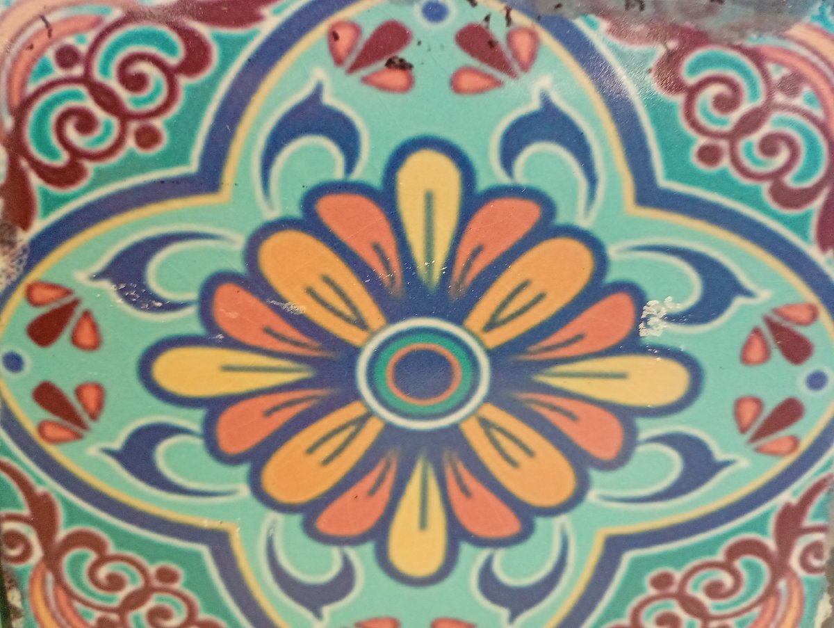 Ornamental eight-petaled flower tile documented in Kabile, Bulgaria