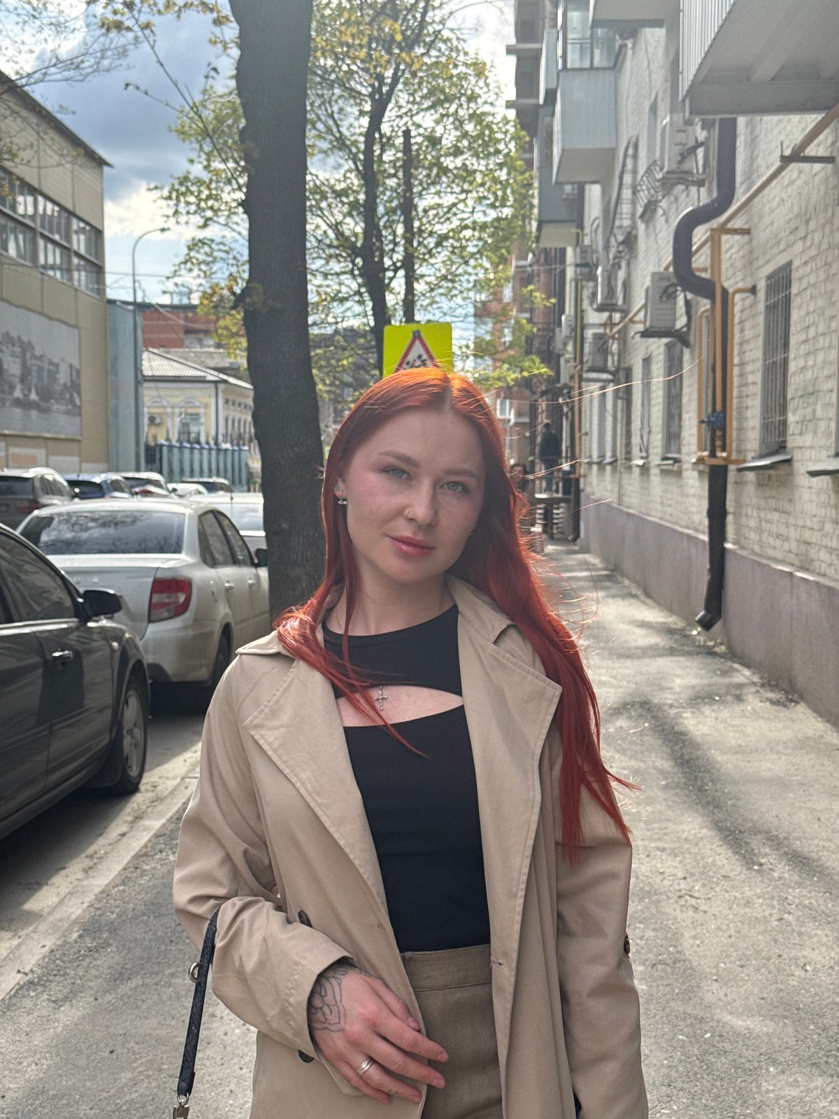 Woman with dog spotted on Rostov-on-Don sidewalk