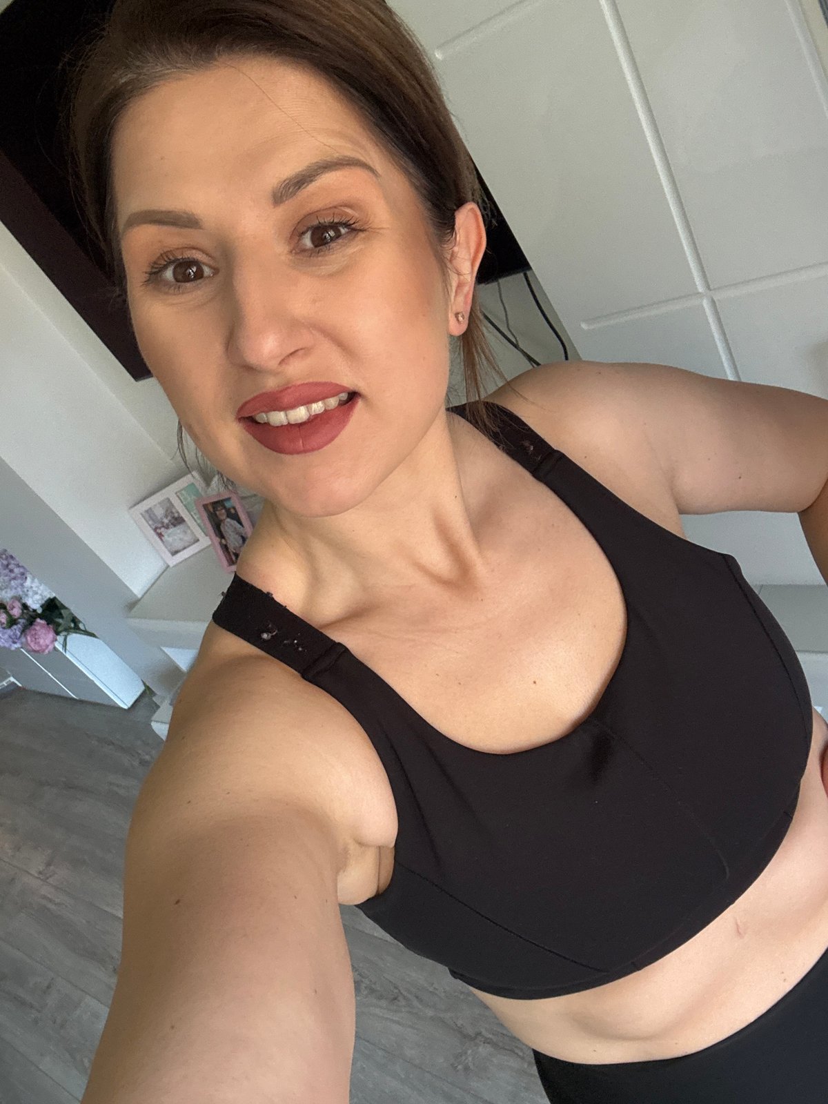 Woman takes multiple selfies indoors across Sofia morning