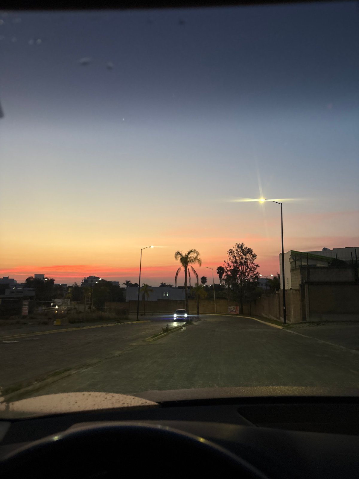 Twilight scene captured from vehicle in Tlaxcalancingo, Mexico