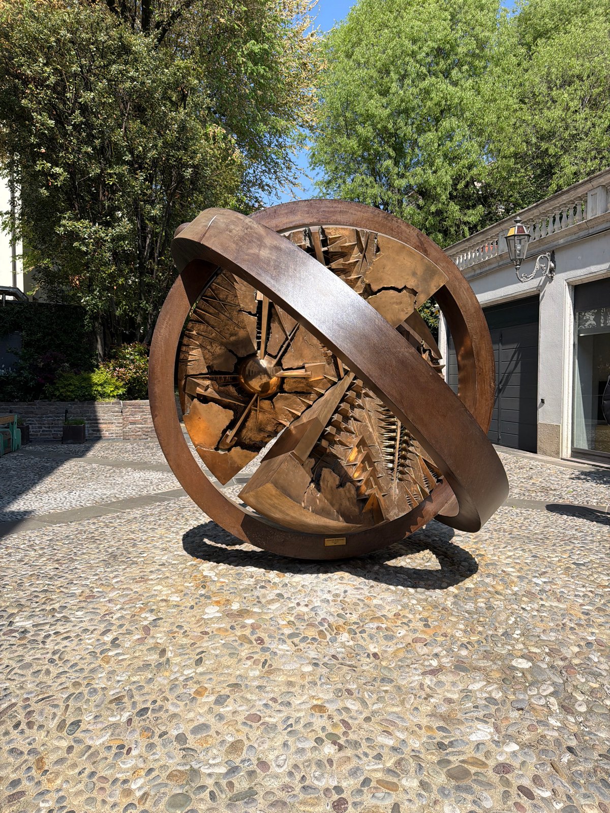 Tourist documents historic landmarks during Bergamo walking tour