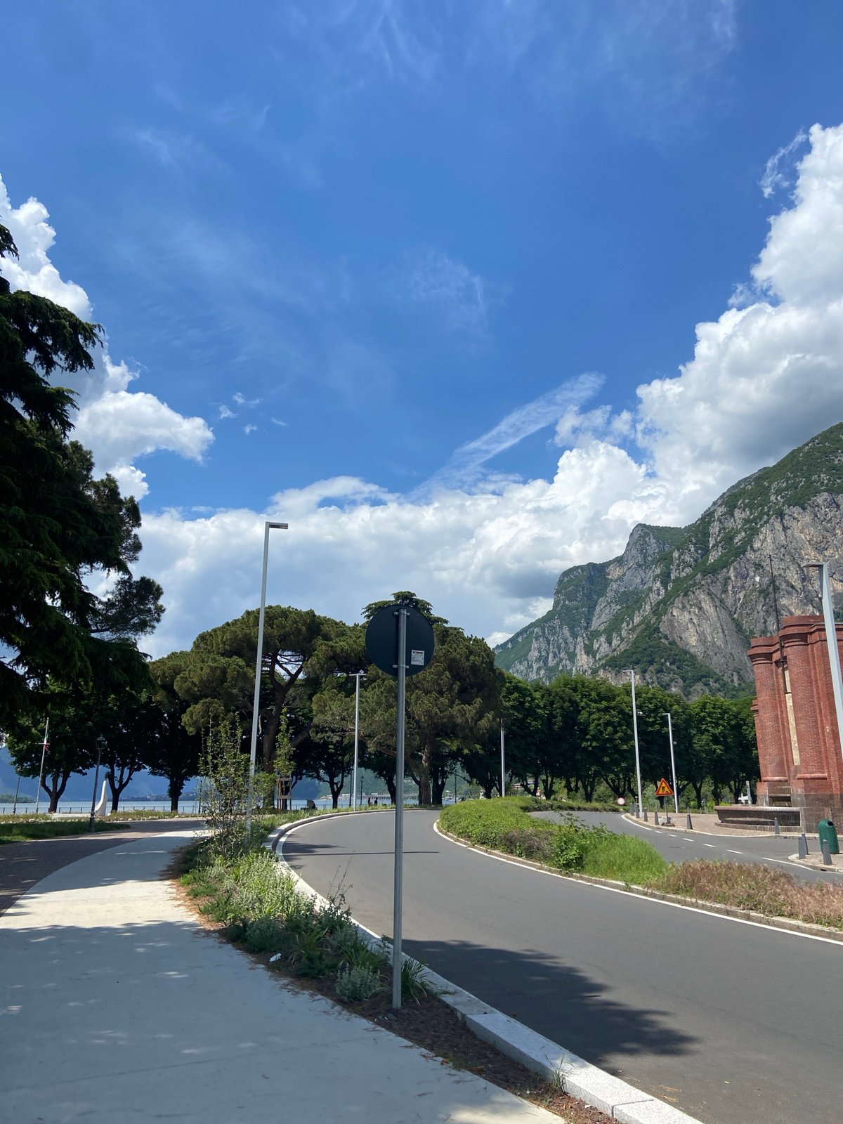 Midday lakeside scenes captured along Lake Como waterfront in Lecco
