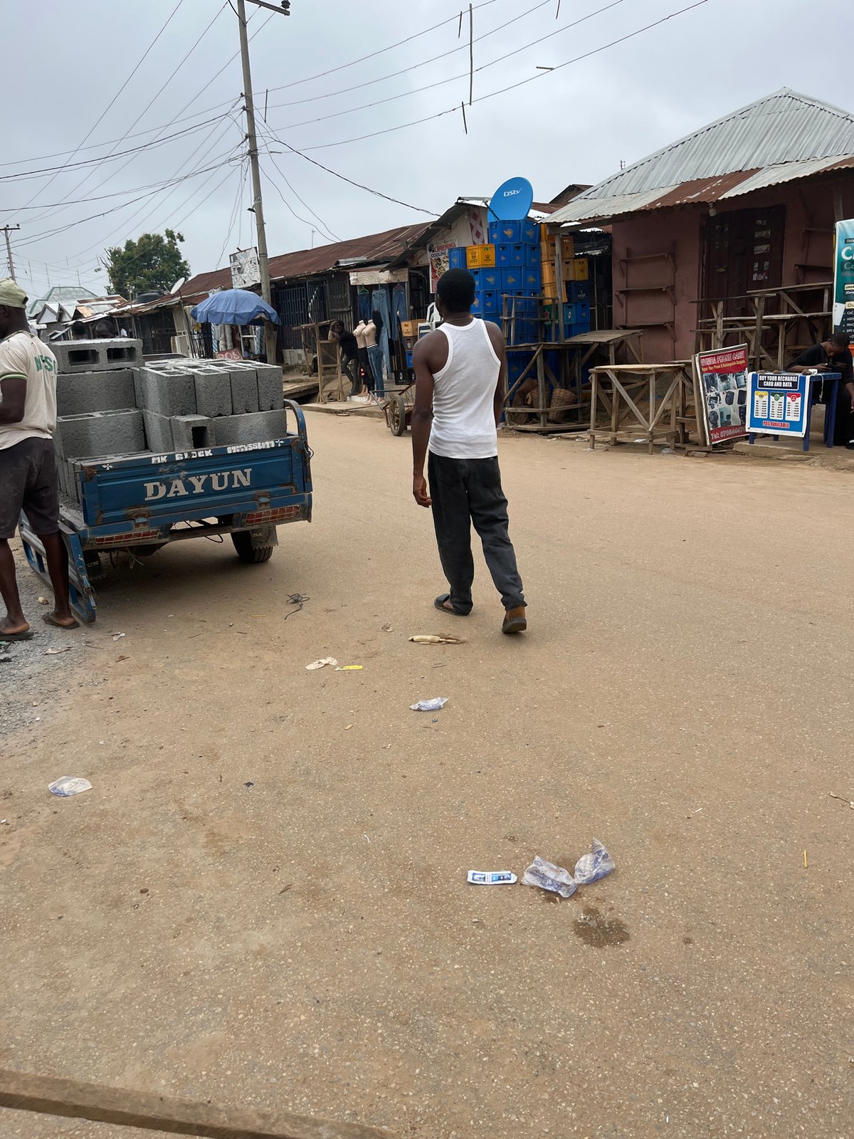 Daily market life documented across Abuja commercial district