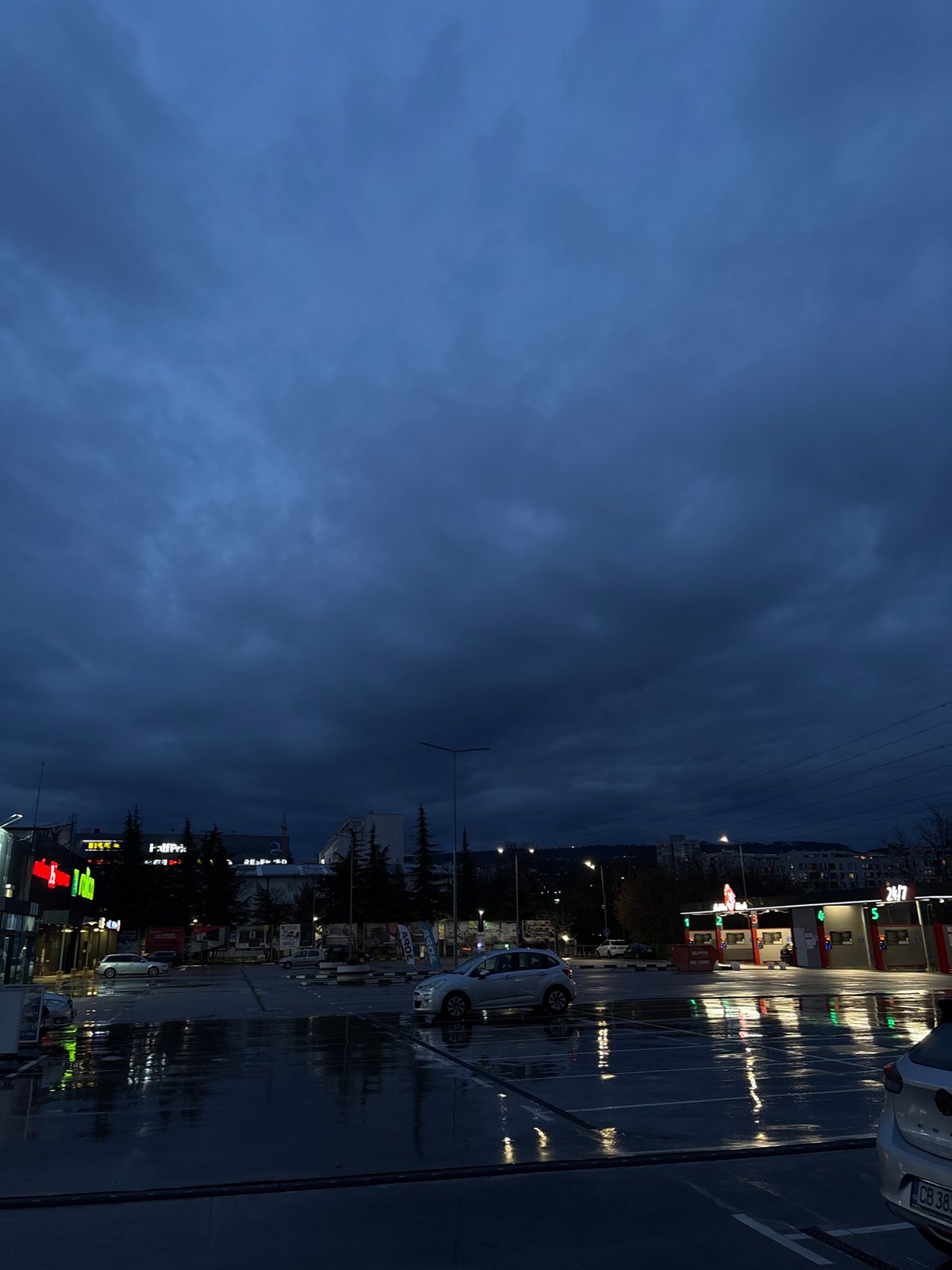 Rainy dusk scene documented at Varna gas station