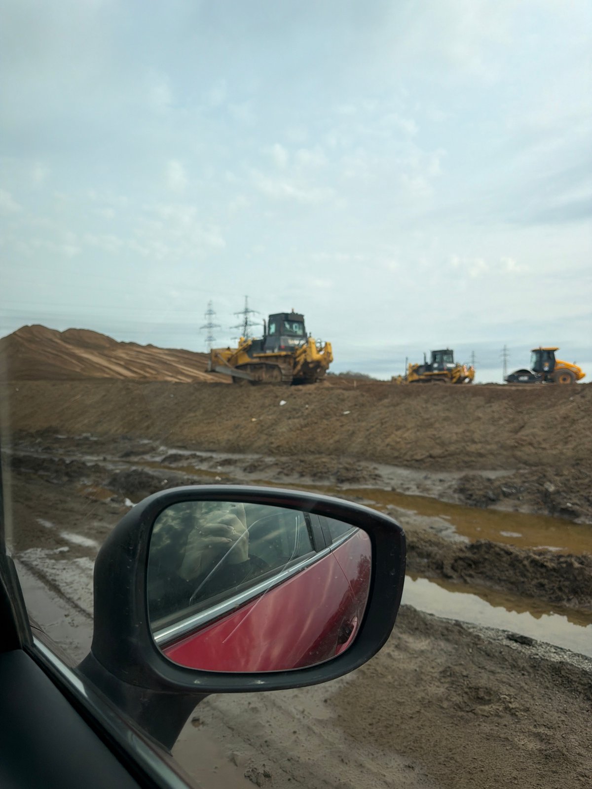 Road construction underway in Zav'yalovo, Russia early morning